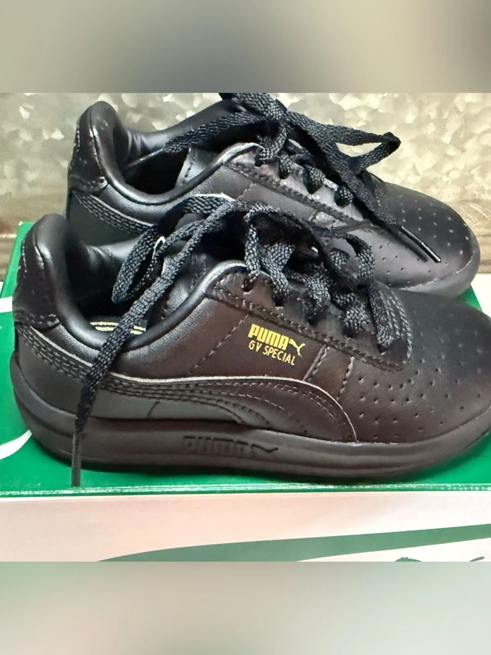 Puma Kids Black Low-Top Lace Sneakers with Gold Logo